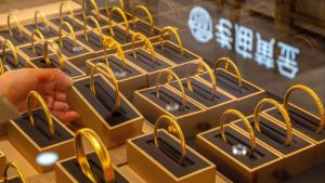 Китайският център за търговия със злато се разтърси, тъй като втората платформа е изправена пред платежна криза